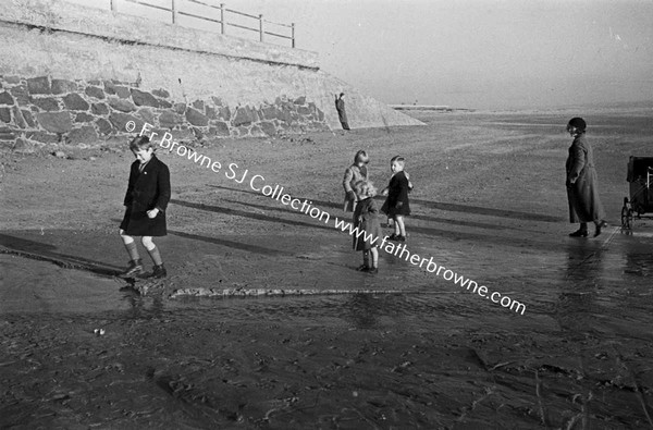 PLAYING ON THE STRAND